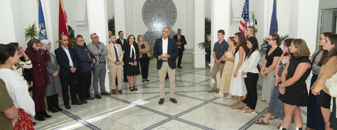 Ambassador Talwar speaks to students and faculty in the main hall of the Tangier Campus building